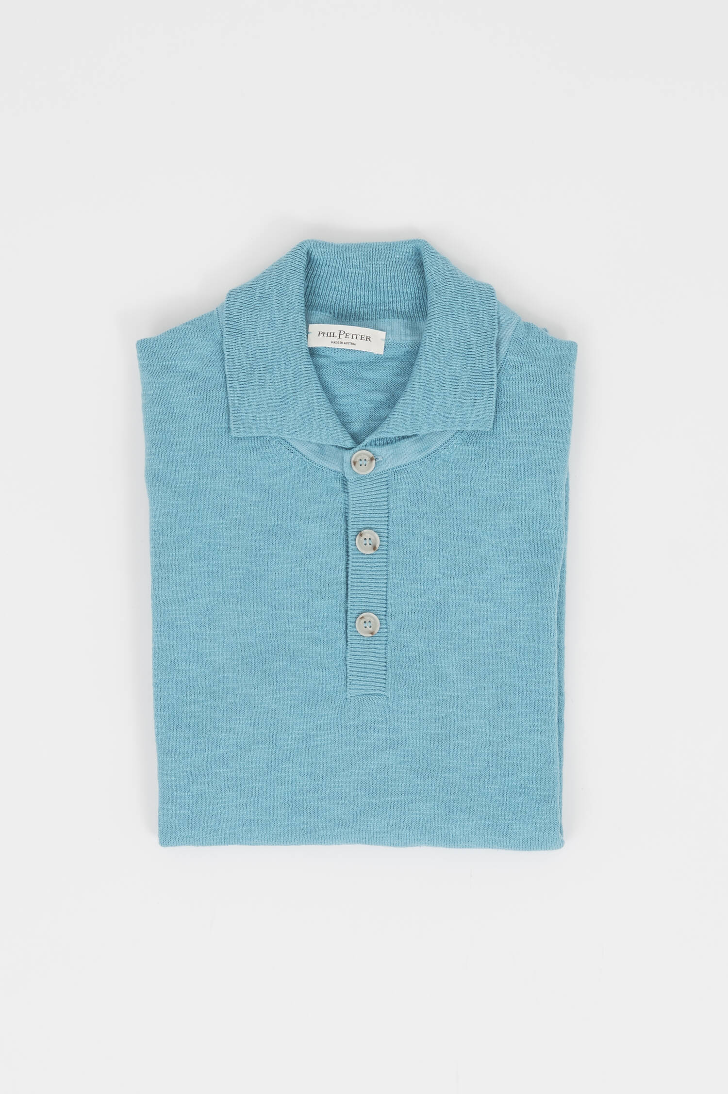 Srickpolo in Türkisblau