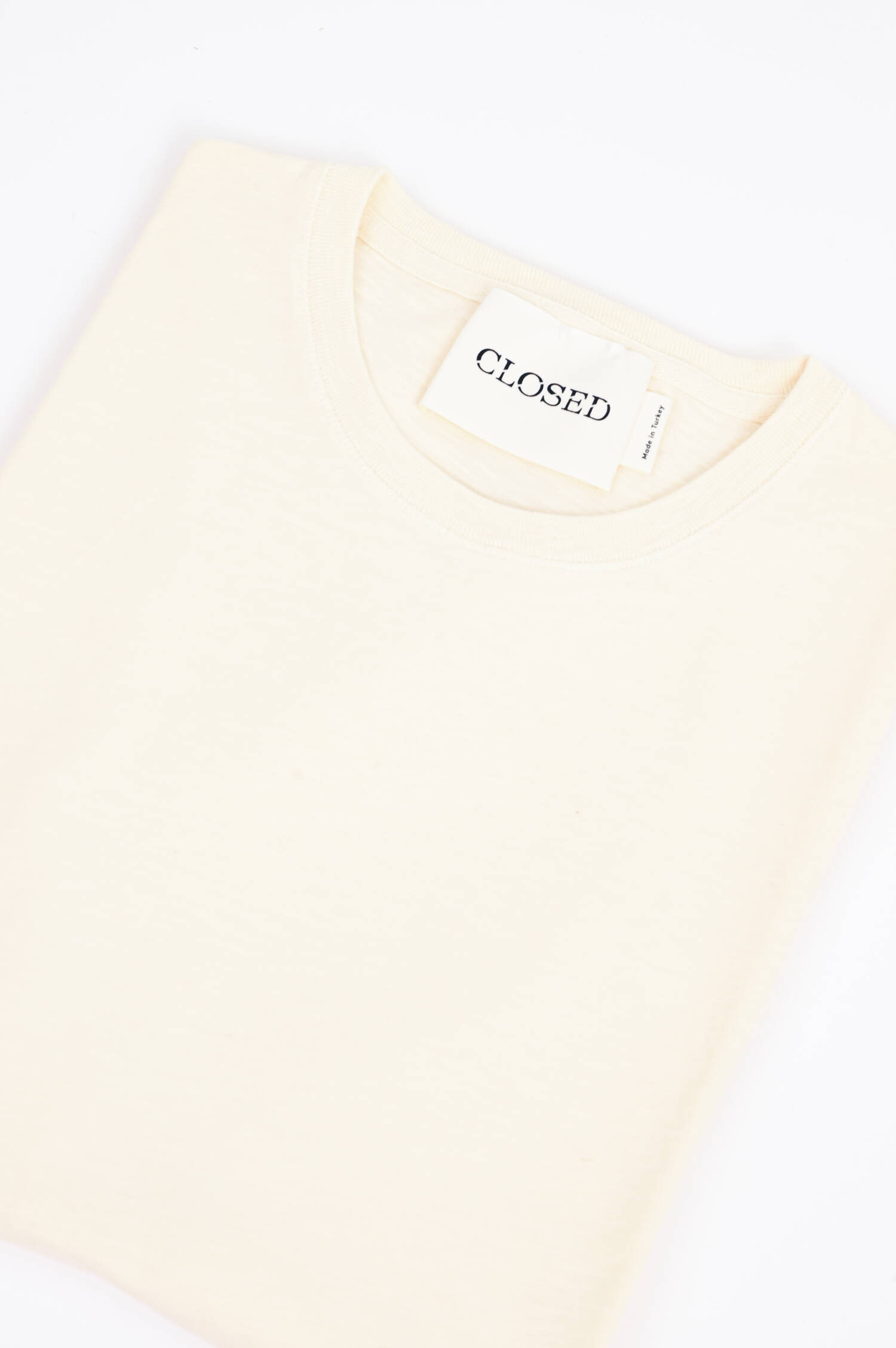 T-Shirt mit Logo-Stickerei in Creme