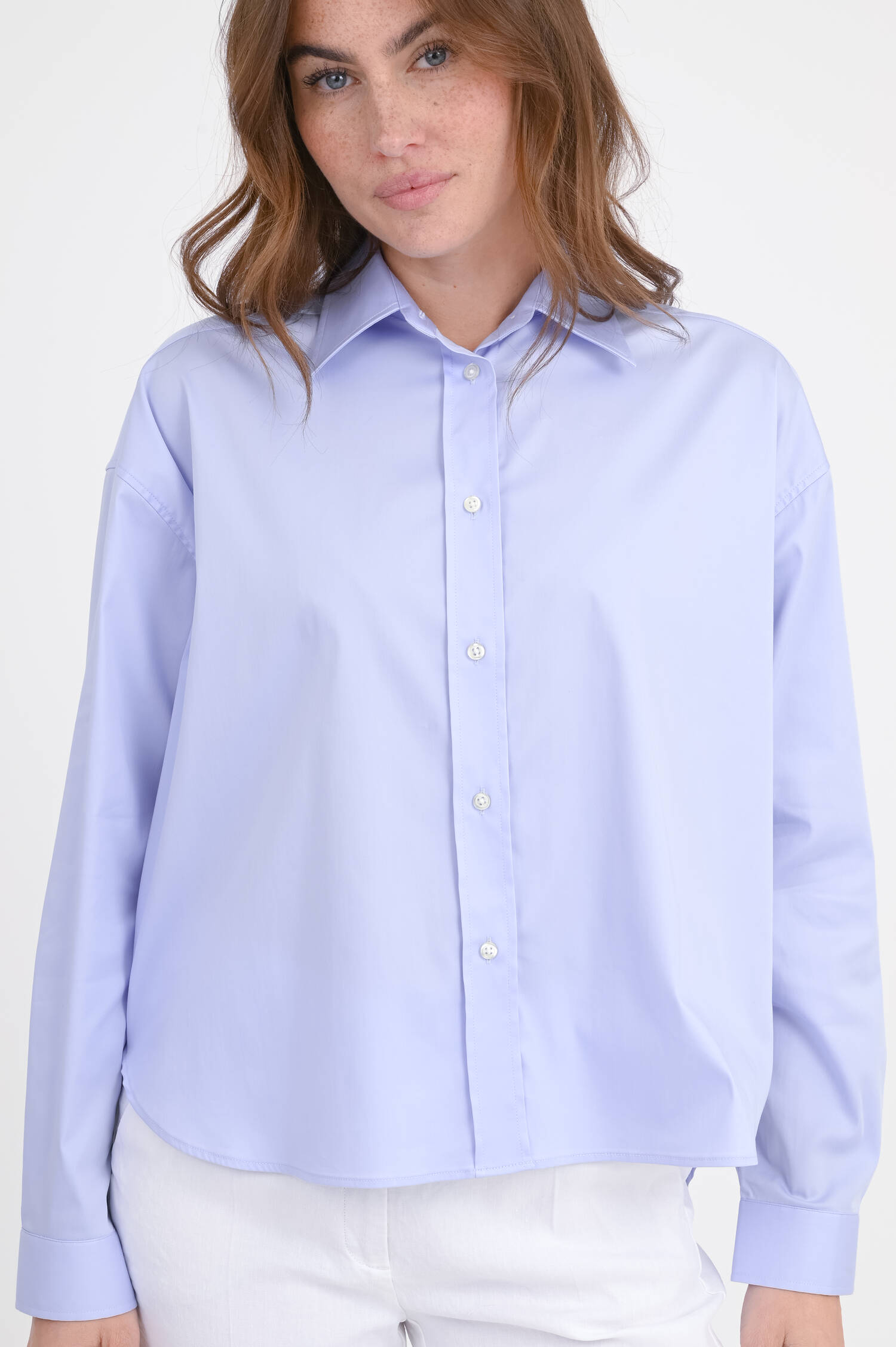 Bluse mit verlängertem Rücken in Hellblau Bluse mit verlängertem Rücken in Hellblau