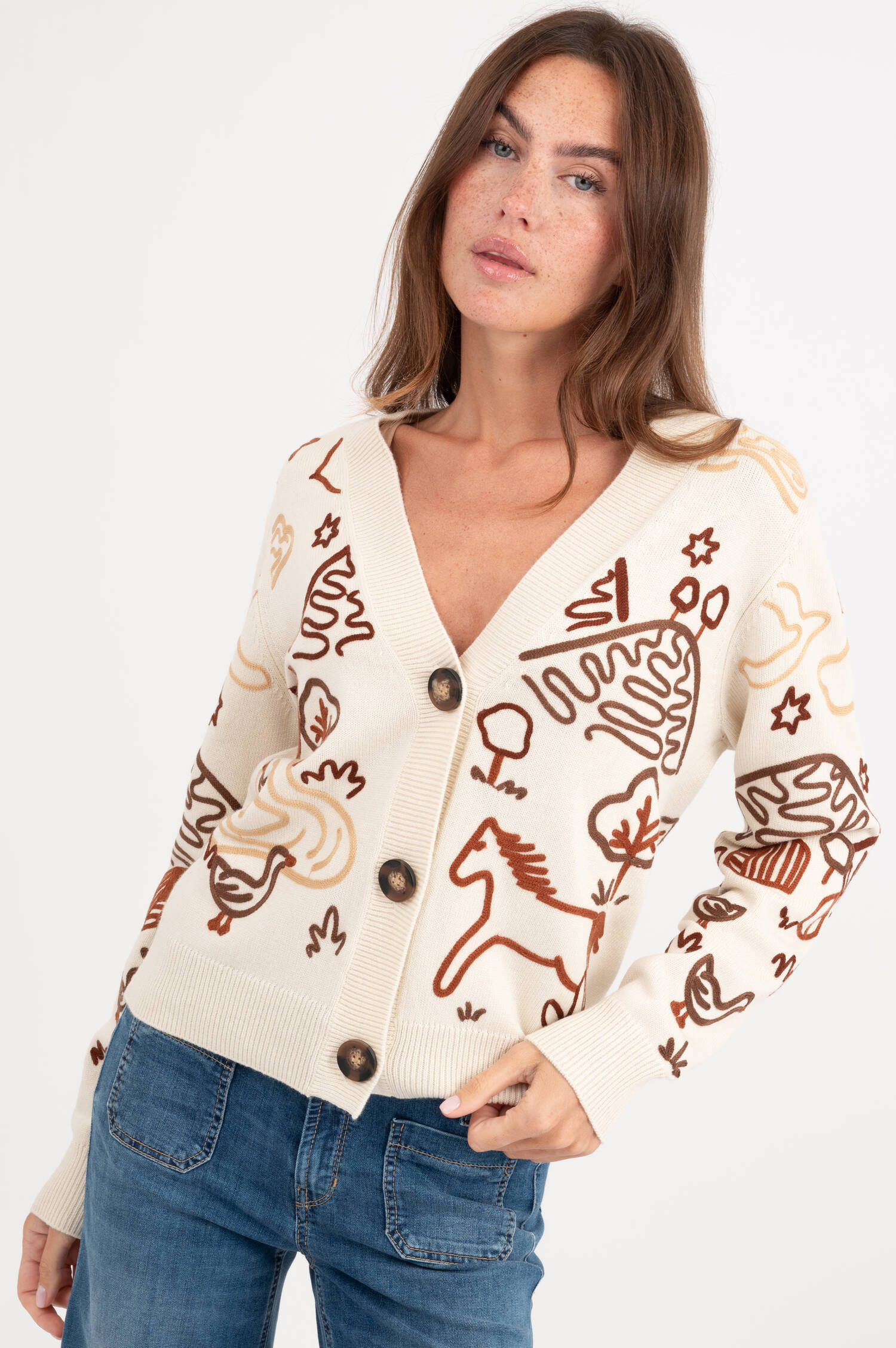 Strickweste mit Stick-Motiven in Creme