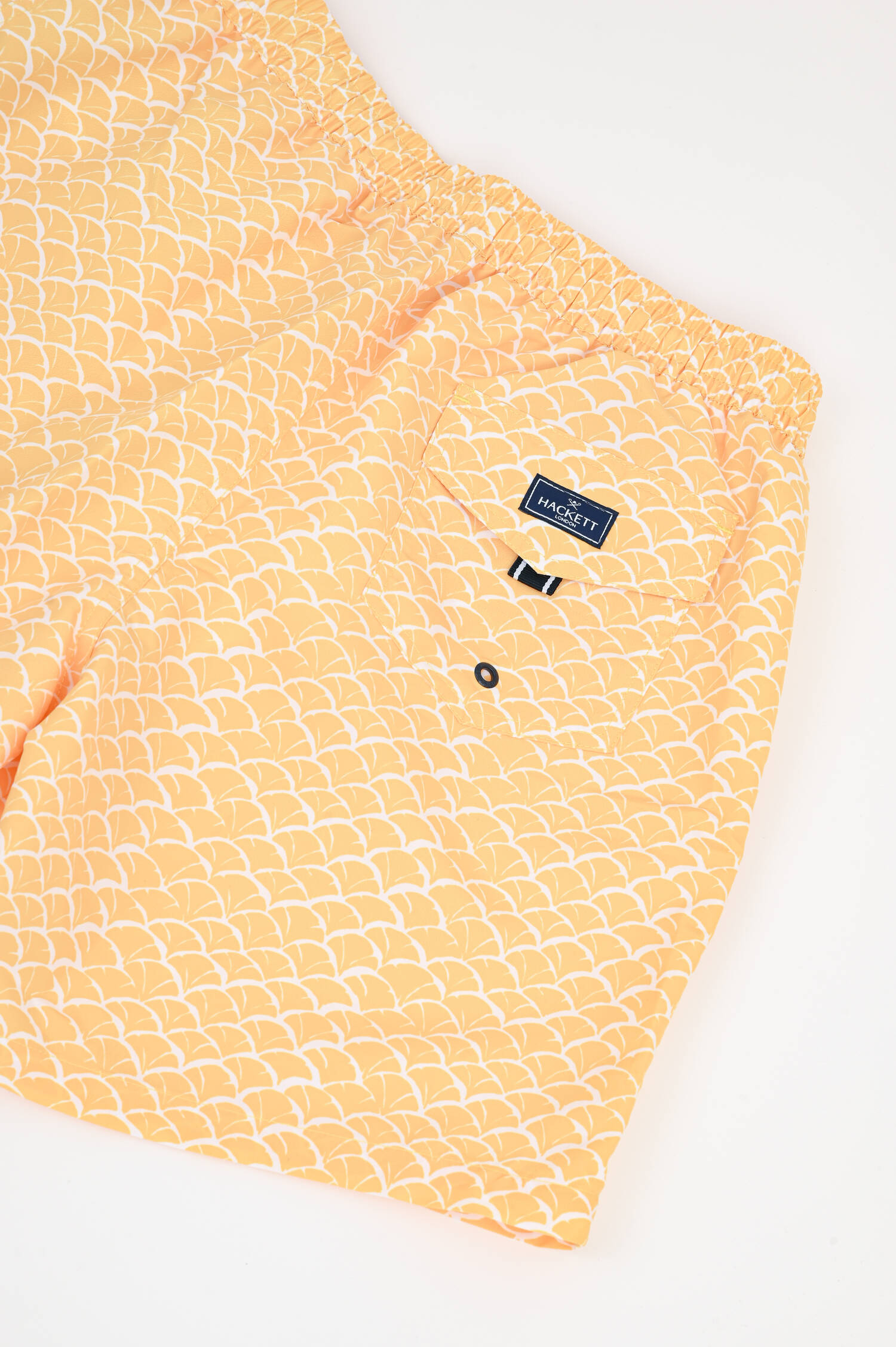 Badeshorts mit Print in Gelb/Weiß