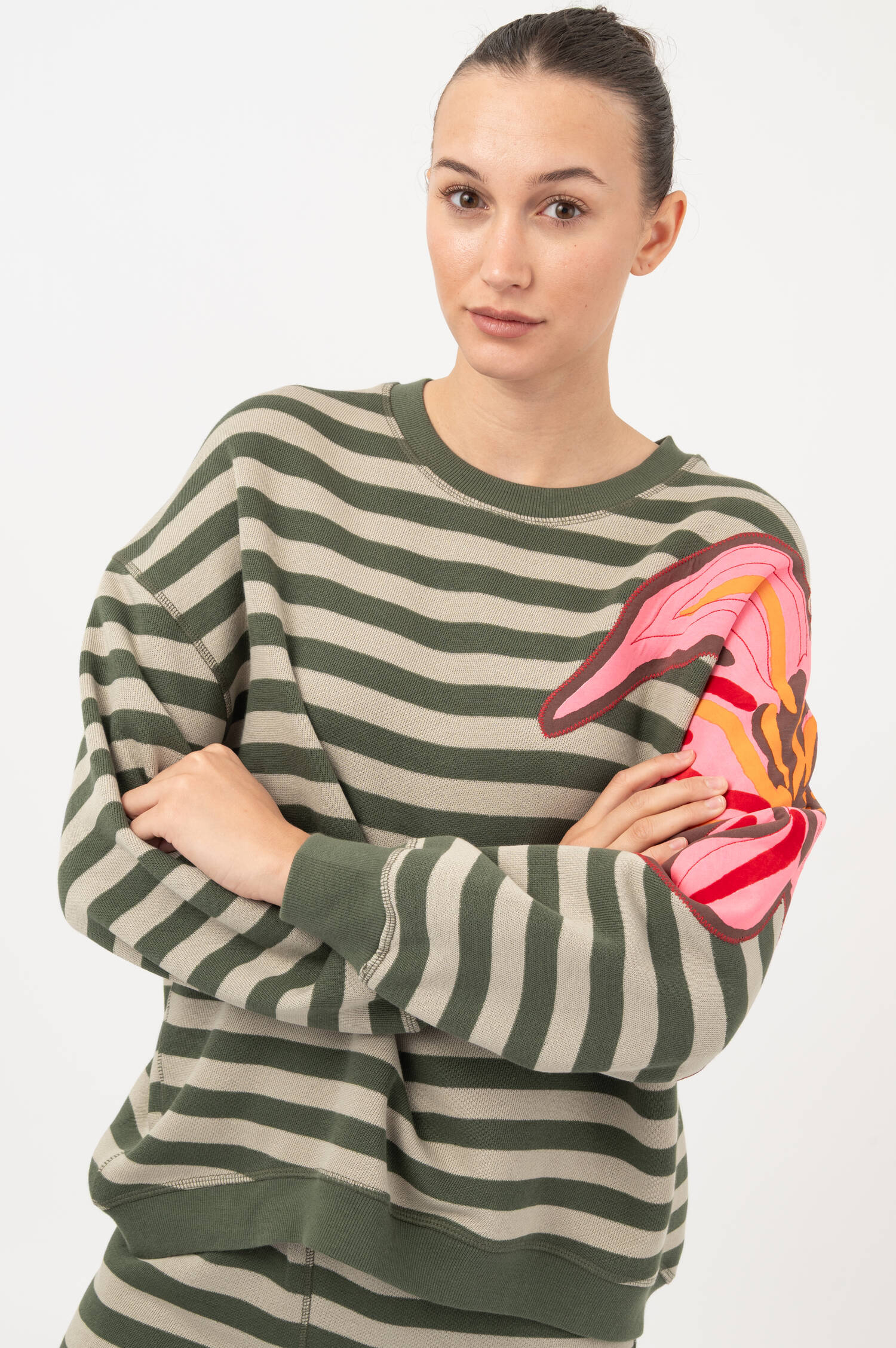 Inside-Out Sweater HONI in Grün/Pink Inside-Out Sweater HONI in Grün/Pink