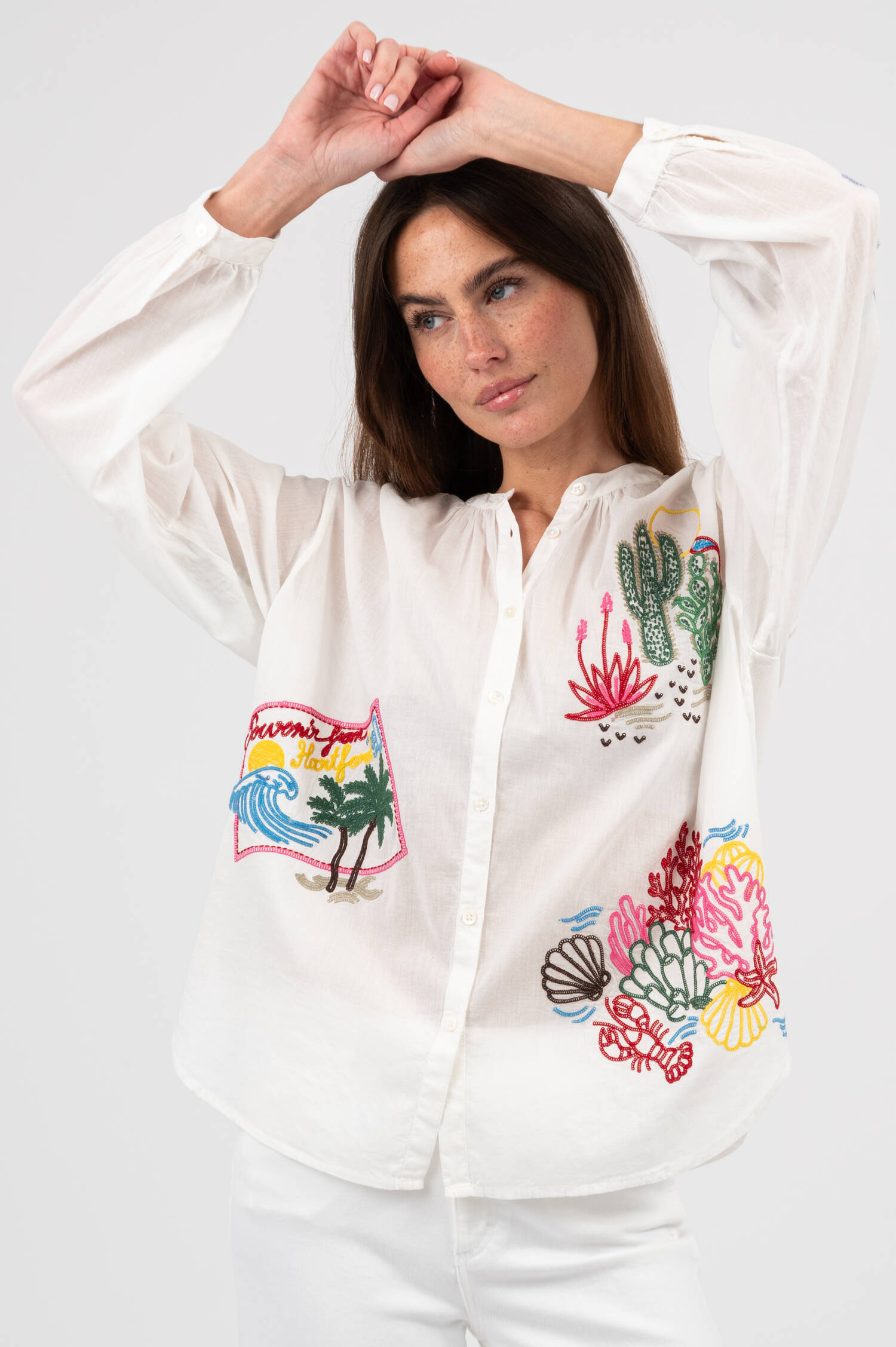 Bluse mit buntem Stick in Weiß