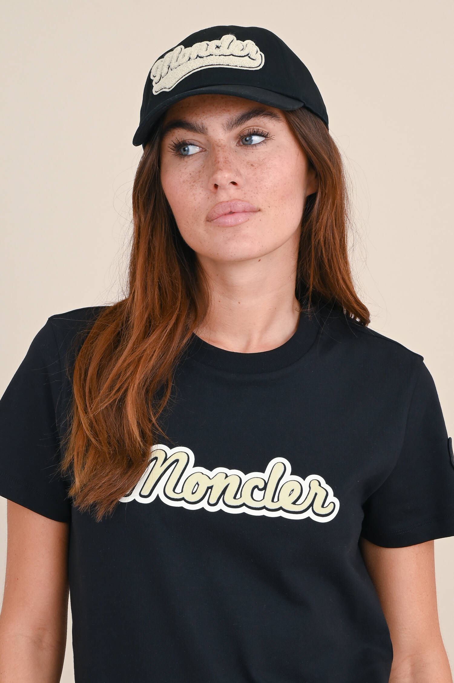 Basecap mit Frottee-Logo in Schwarz