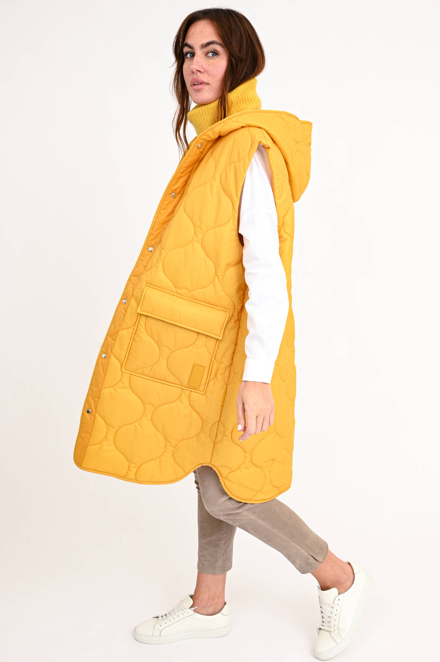 Lange Steppweste in Gelb