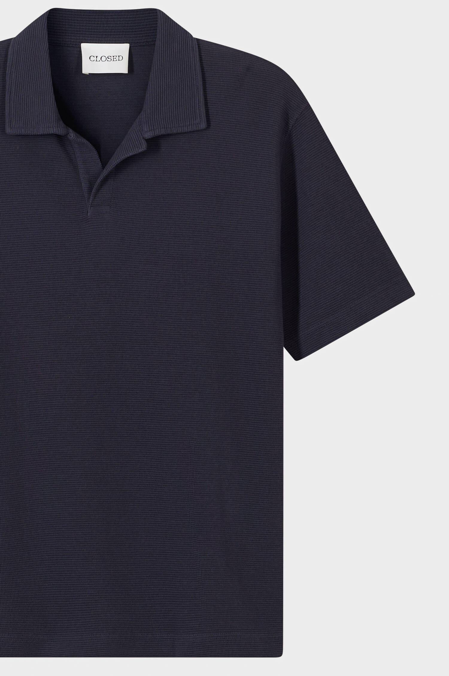 Poloshirt mit Waffel-Optik in Dunkelblau