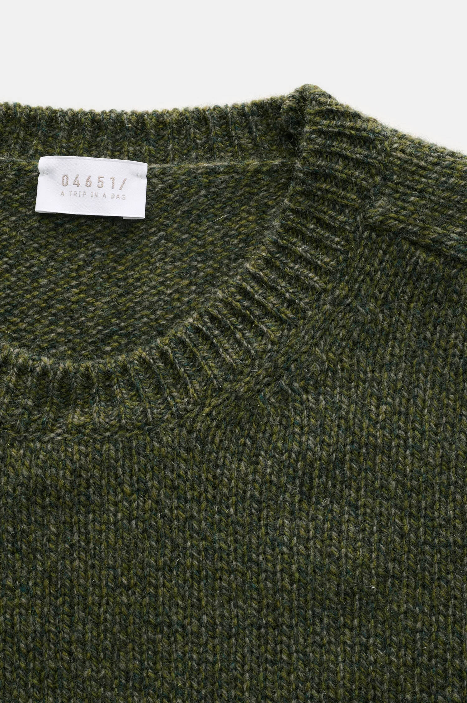 Mouliné Woll-Pullover in Grün meliert
