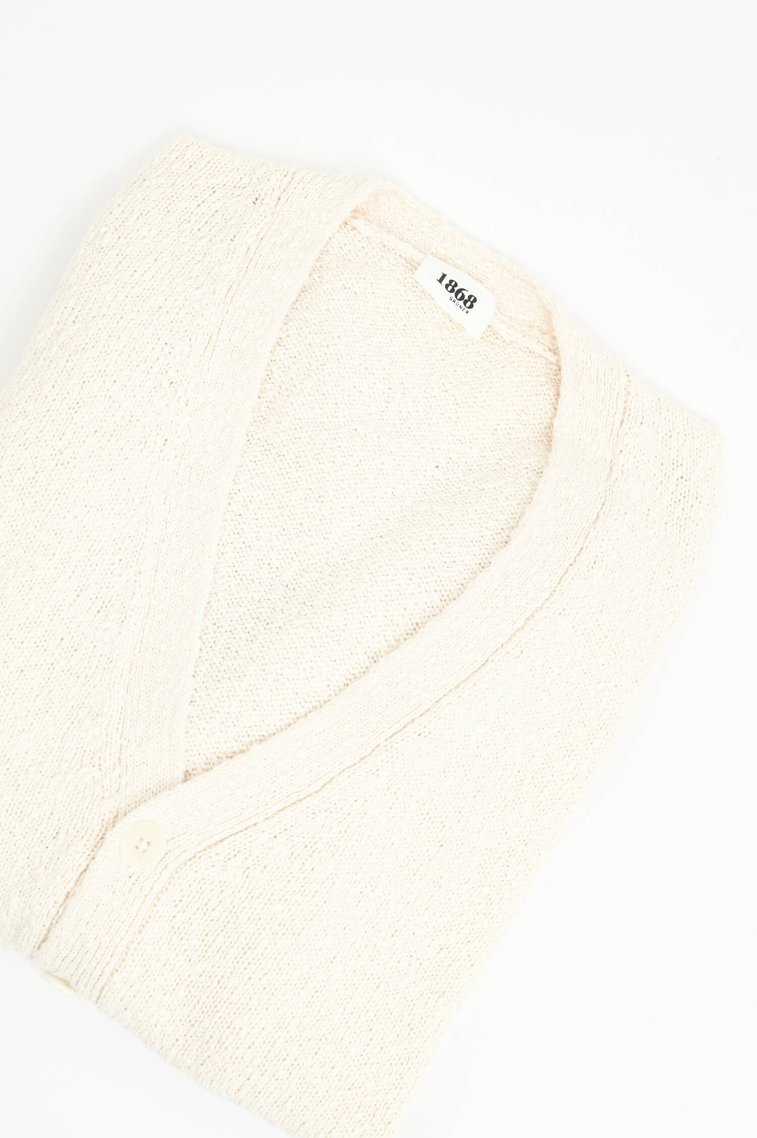 Strickweste aus Baumwolle in Creme Strickweste aus Baumwolle in Creme