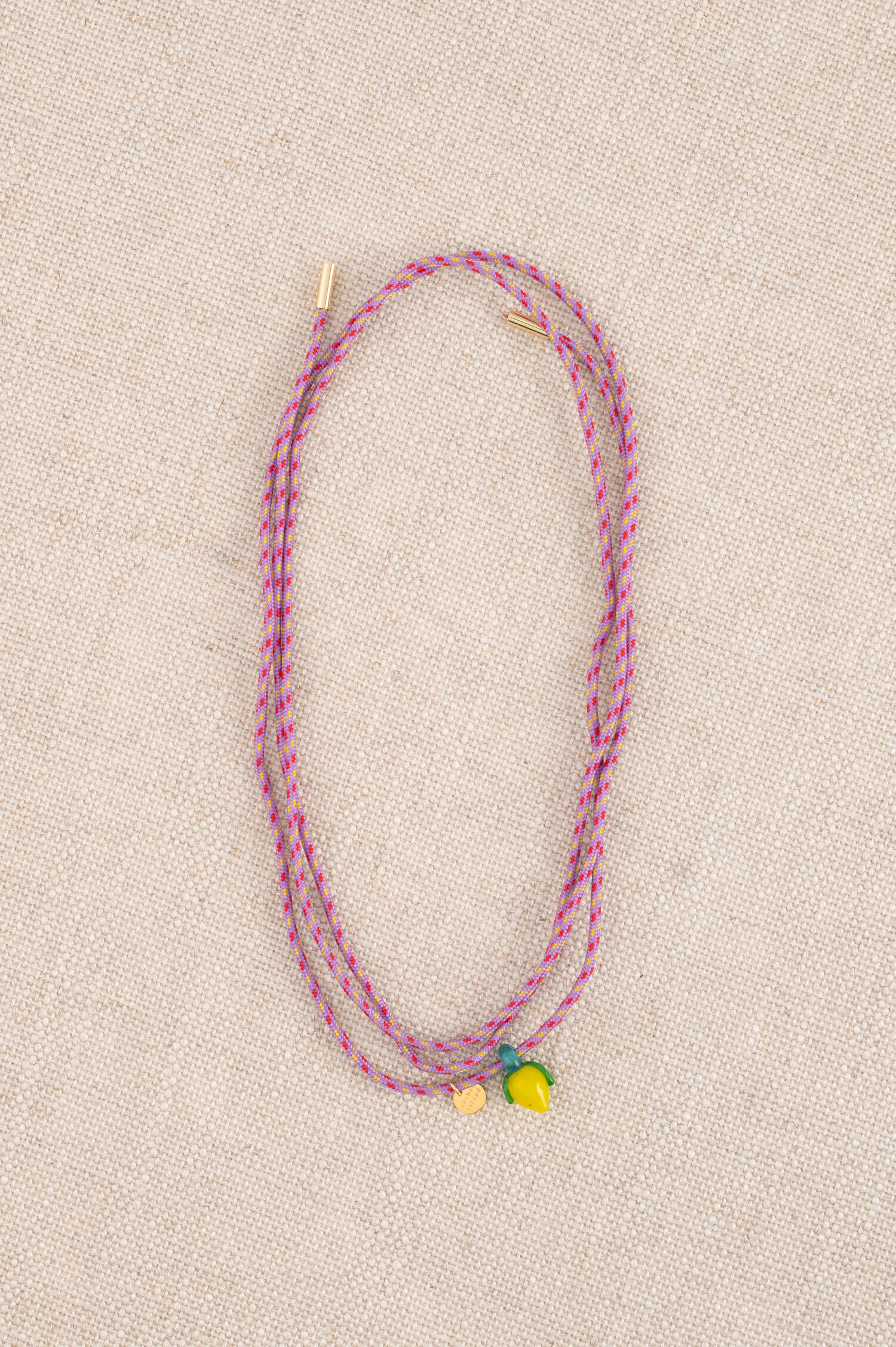 Armband mit Zitronen Glassperle in Gelb/Rosa Armband mit Zitronen Glassperle in Gelb/Rosa