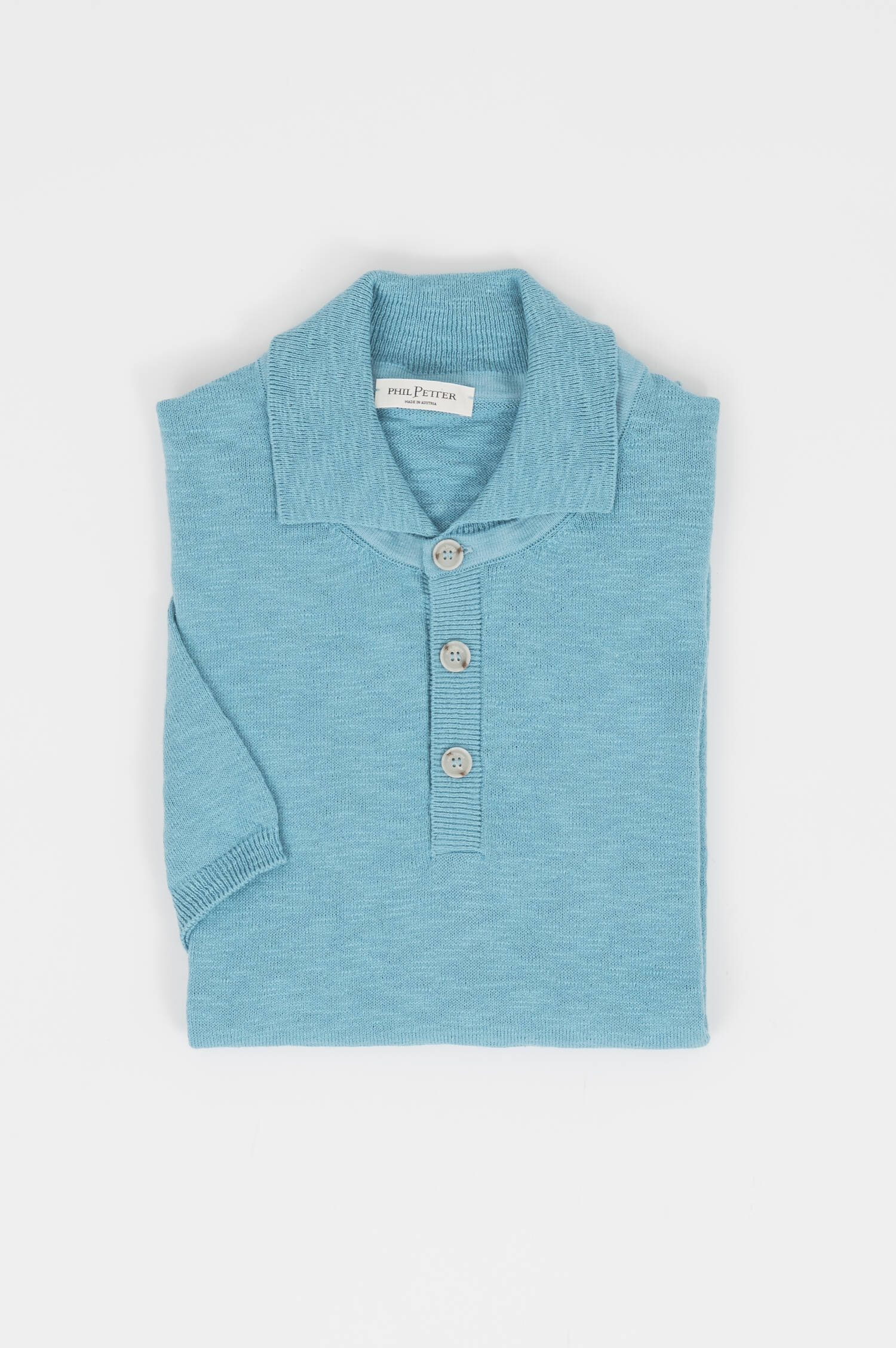 Srickpolo in Türkisblau