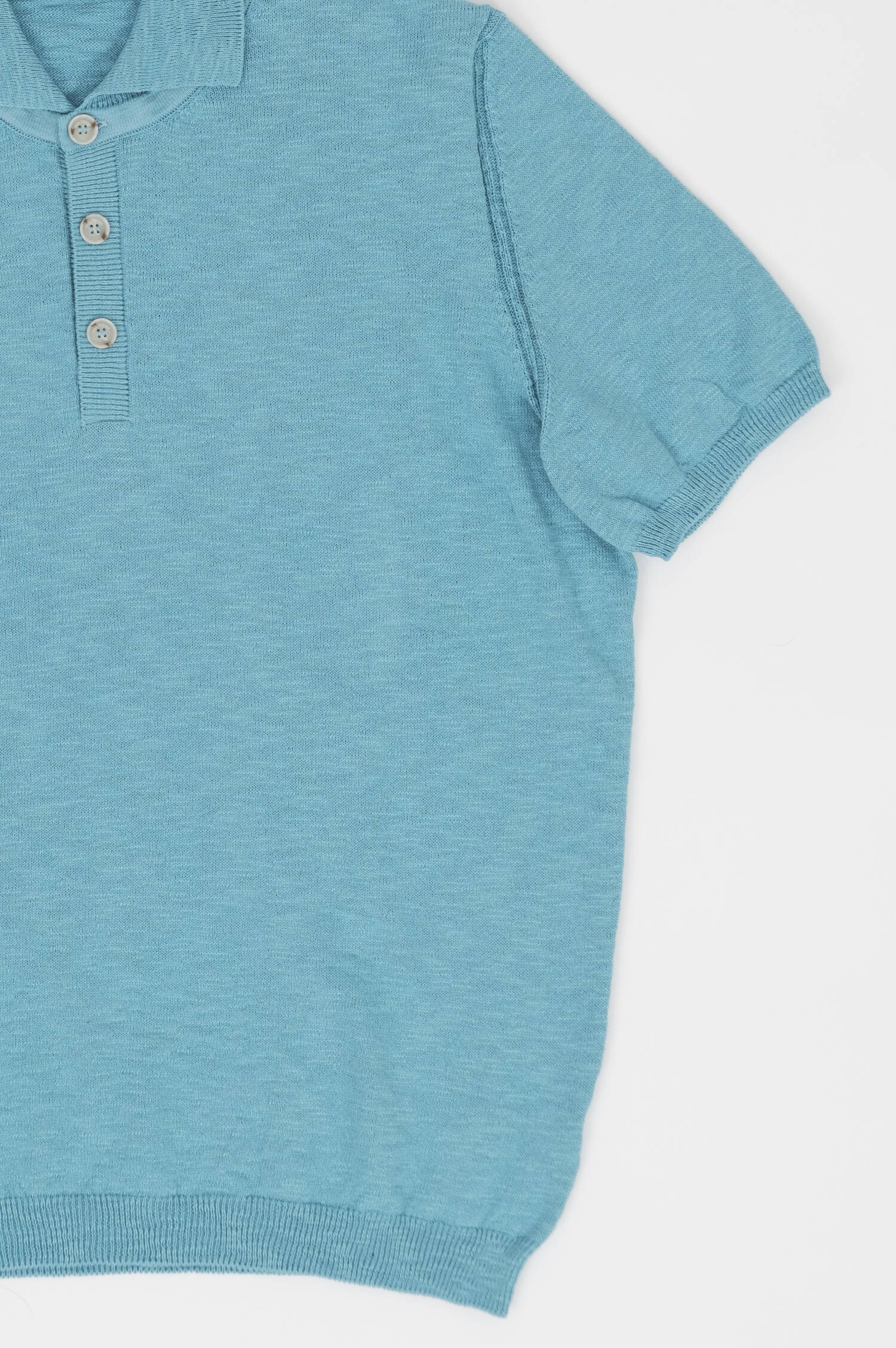 Srickpolo in Türkisblau