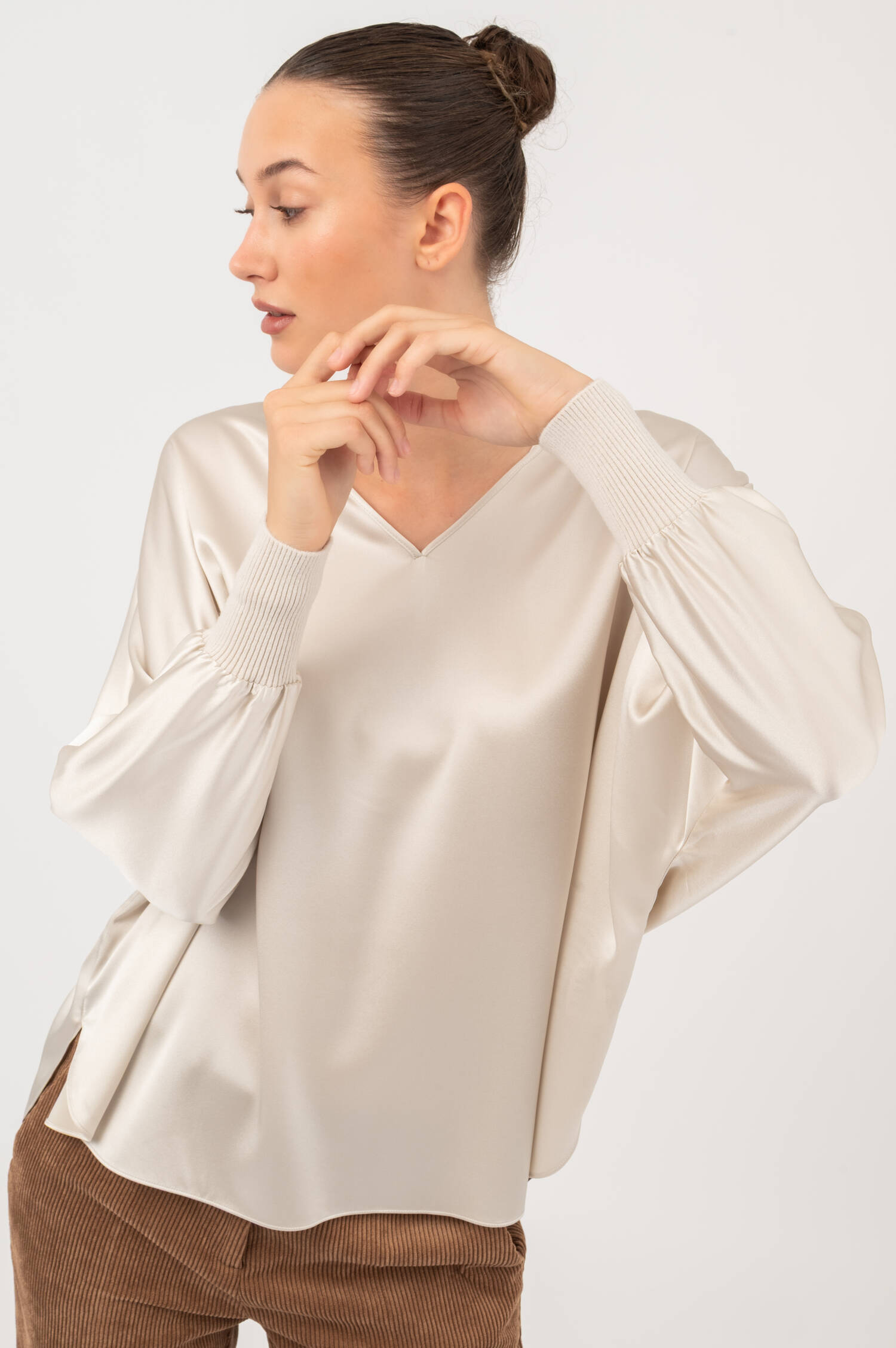 Bluse mit Rippstrickarm in Beige Bluse mit Rippstrickarm in Beige