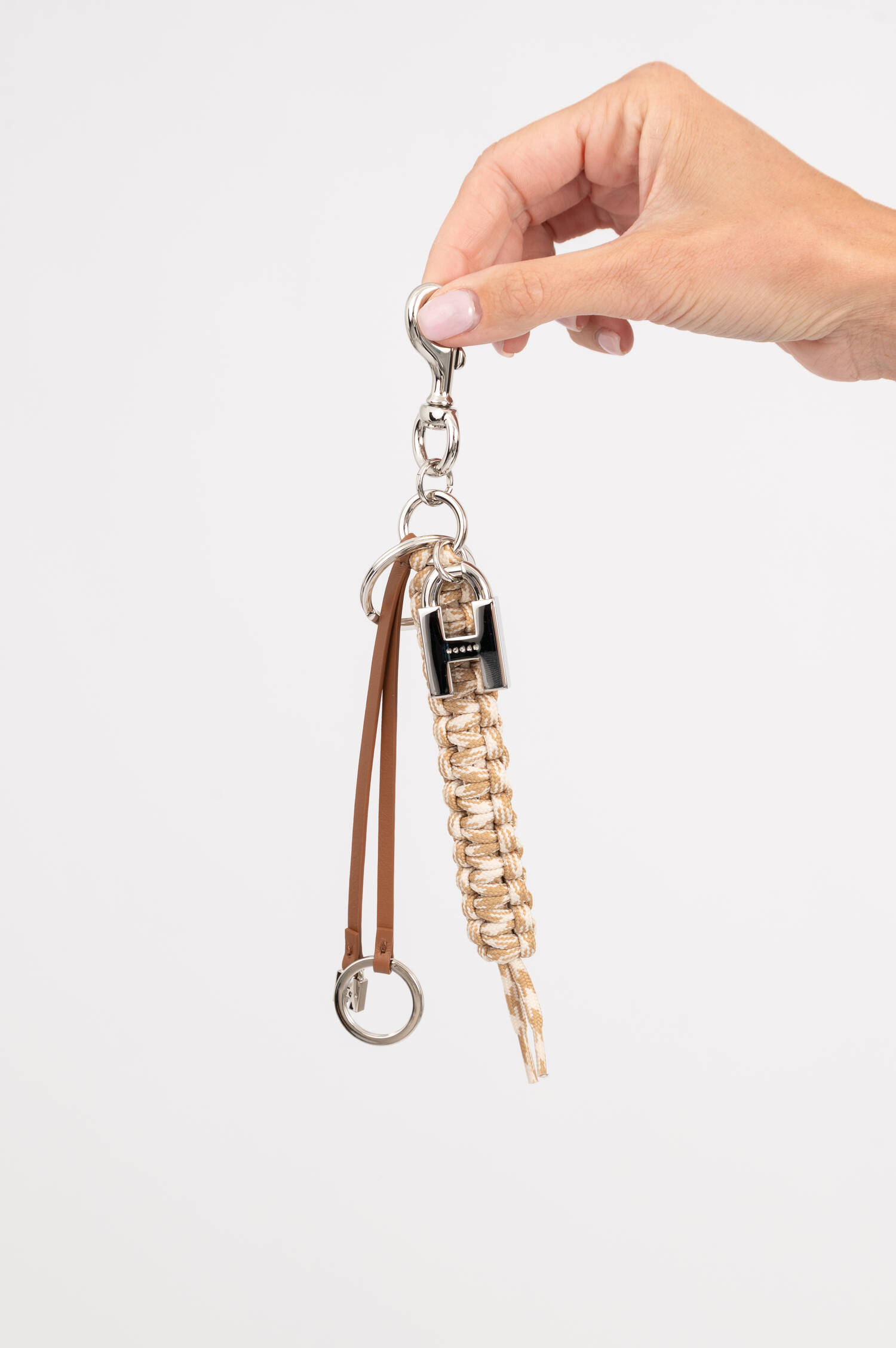 Geflochtener Kordel Taschenanhänger in Beige Geflochtener Kordel Taschenanhänger in Beige