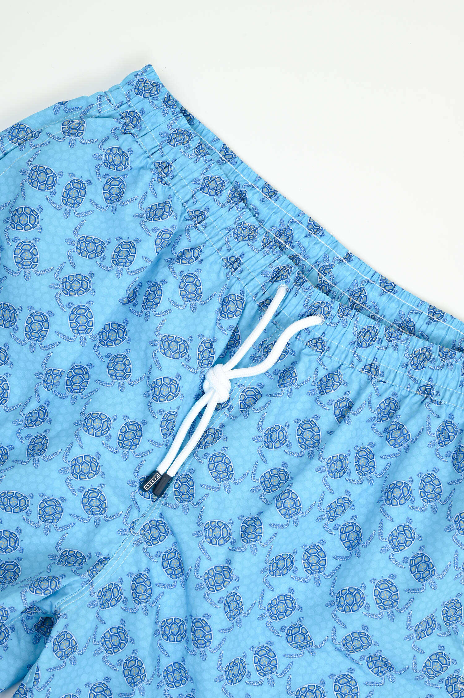 Badehose mit Schildkröten-Muster in Türkis