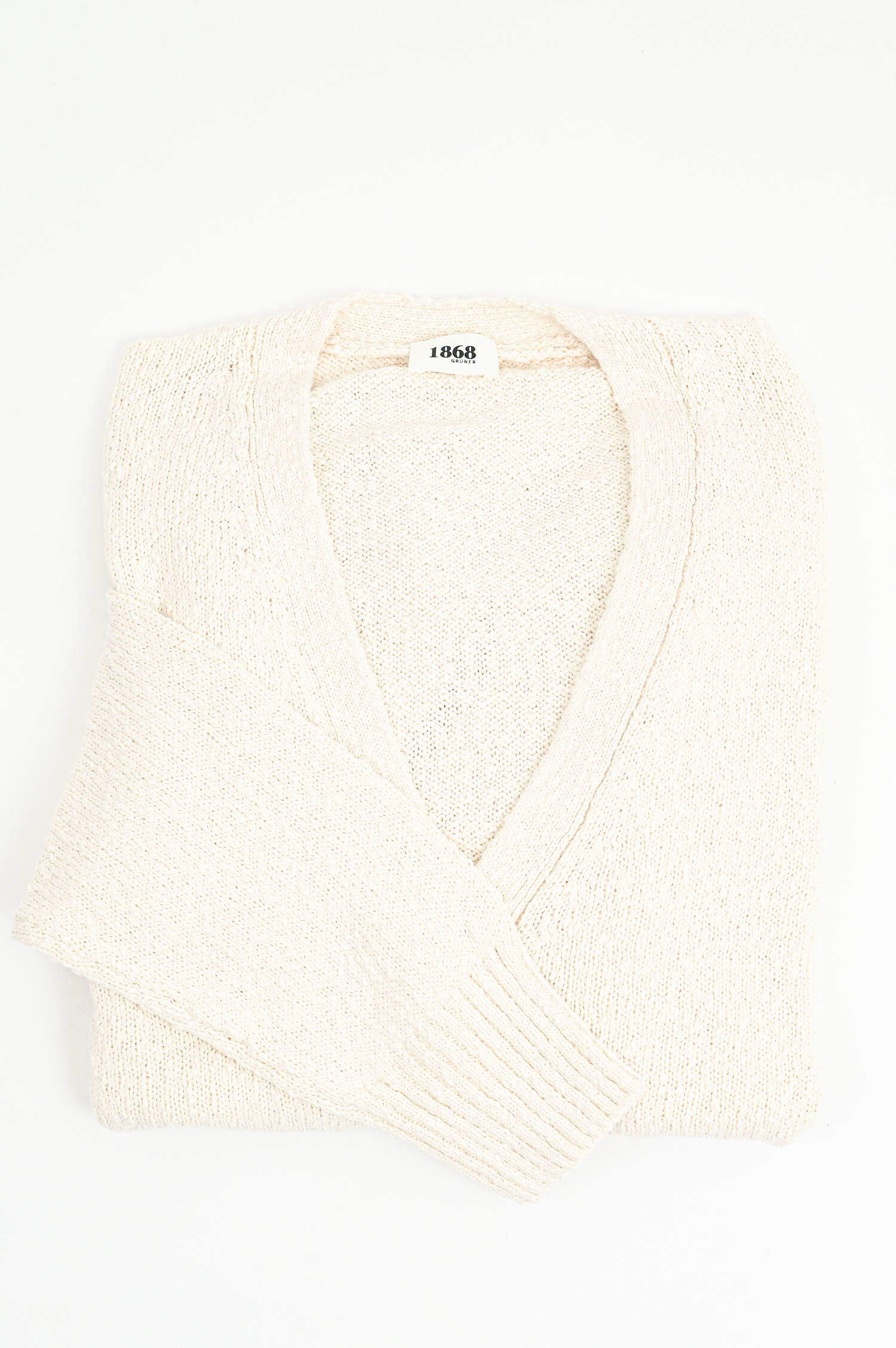 Strickweste aus Baumwolle in Creme Strickweste aus Baumwolle in Creme