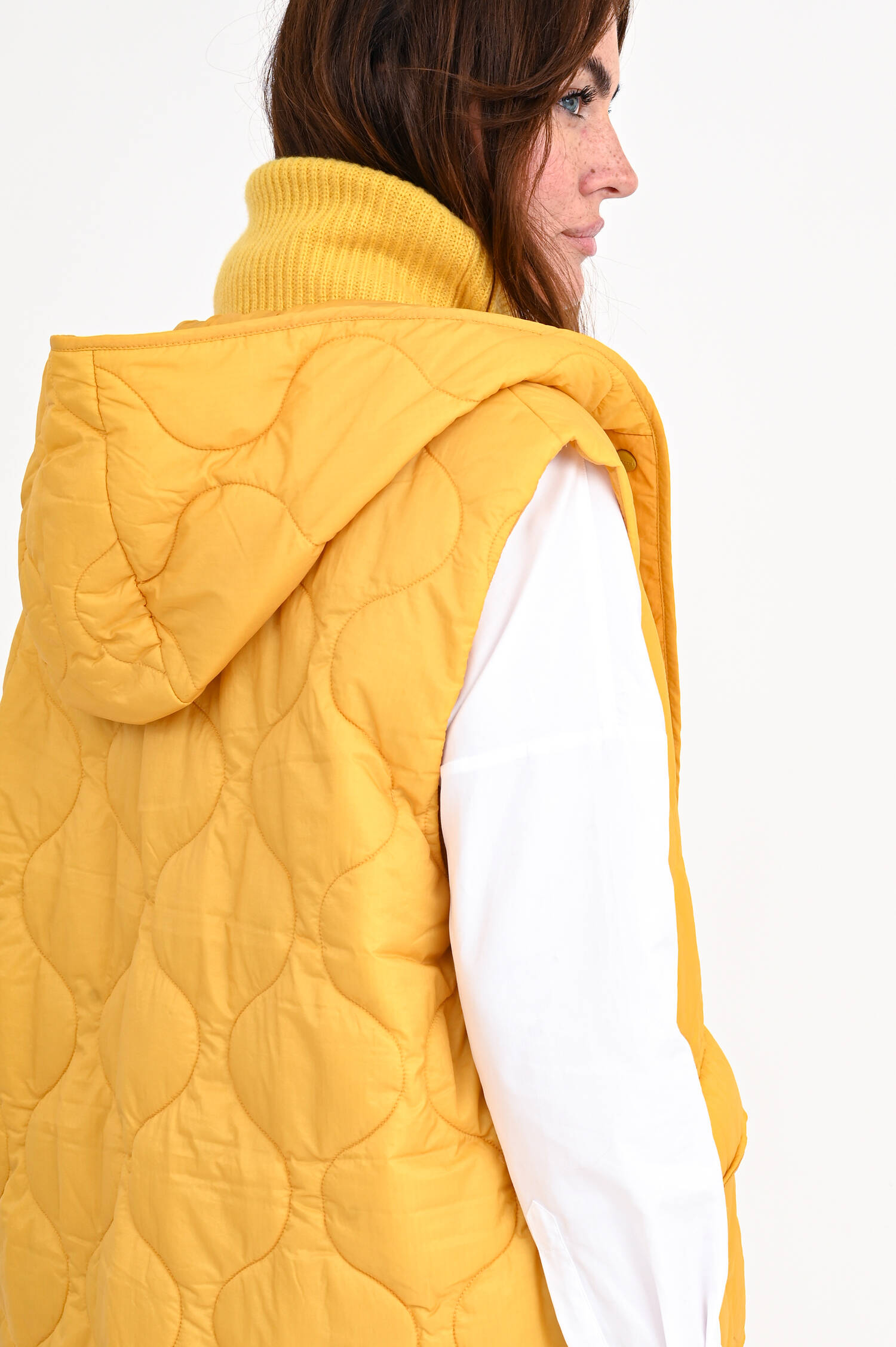 Lange Steppweste in Gelb