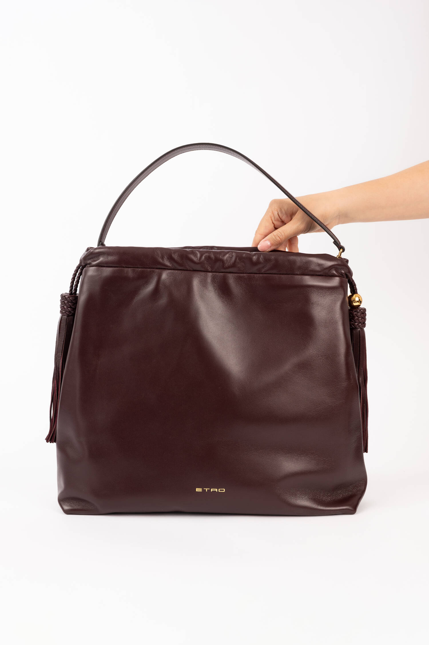Ledershopper mit Quasten in Marone