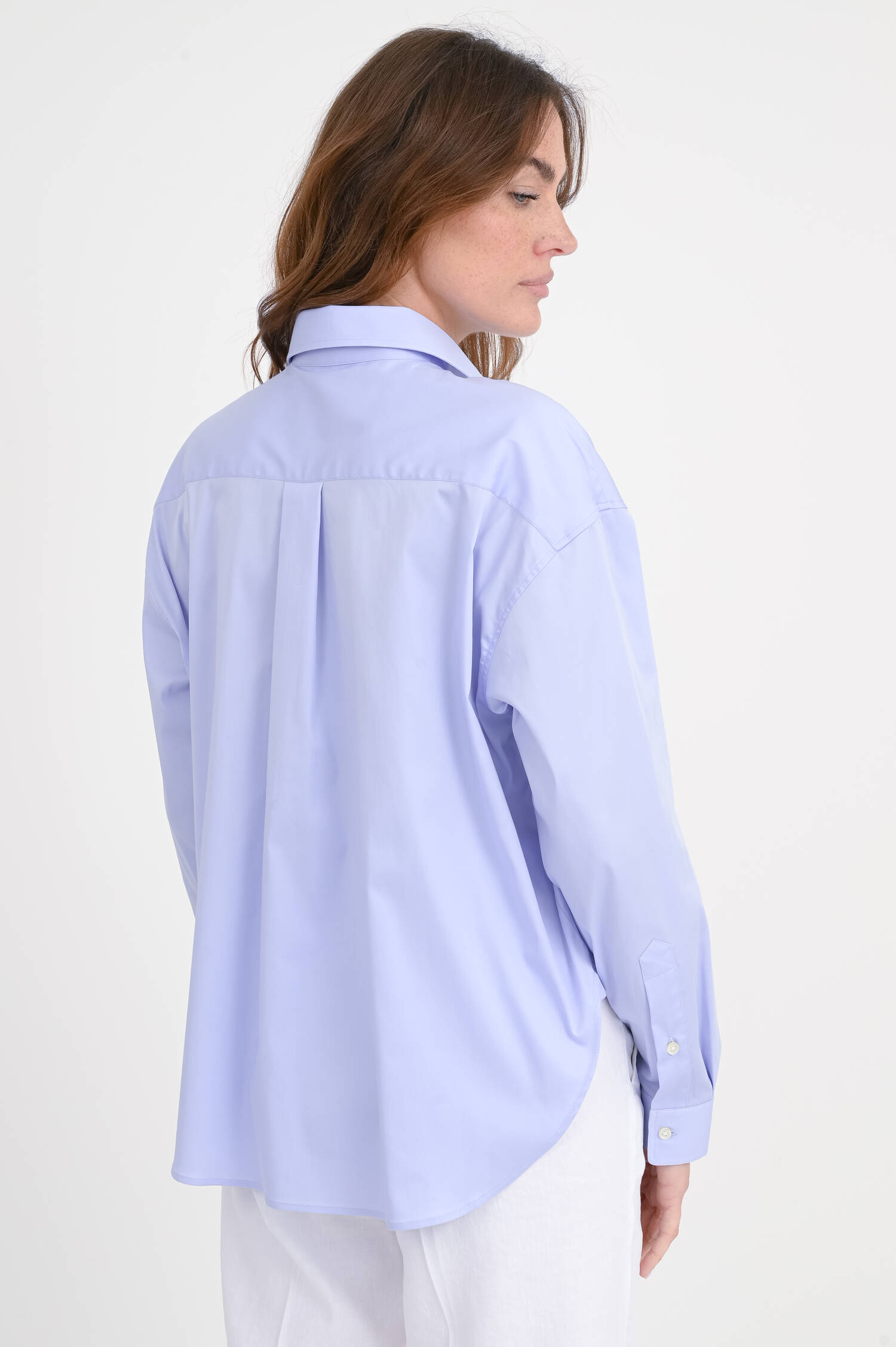Bluse mit verlängertem Rücken in Hellblau Bluse mit verlängertem Rücken in Hellblau