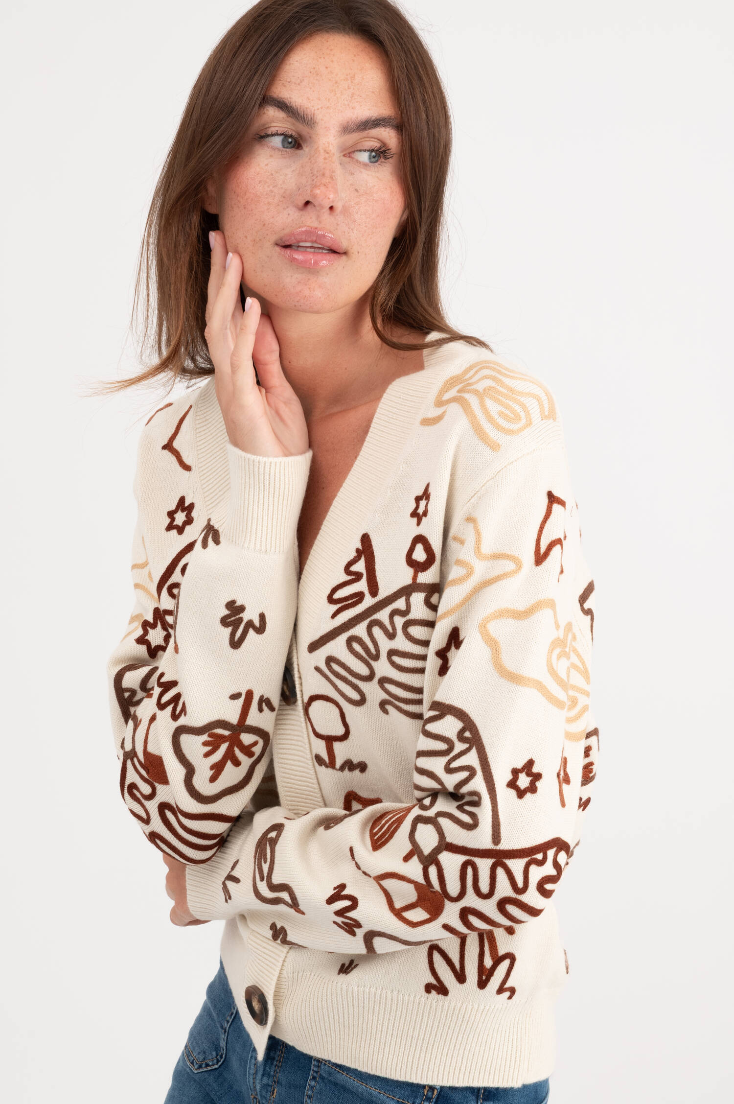 Strickweste mit Stick-Motiven in Creme