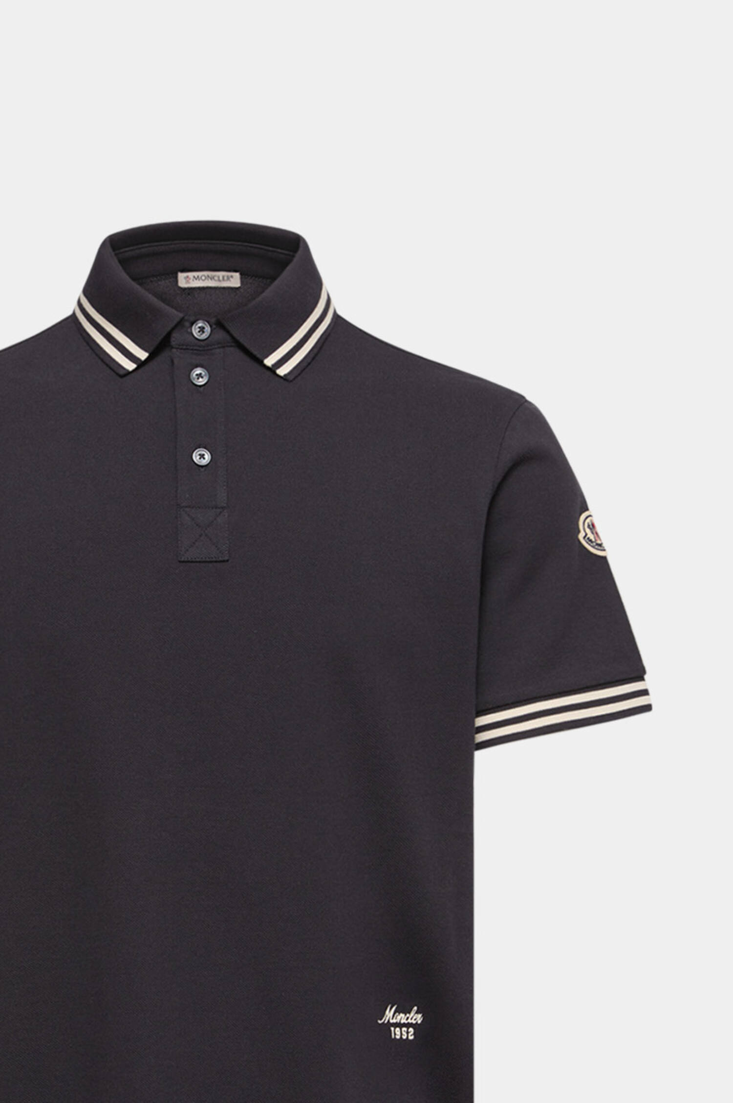 Poloshirt mit Streifakzenten in Navy Poloshirt mit Streifakzenten in Navy